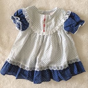 Vintage K.L.L. Blue and White Dress. Red ribbon detail on the front. Size 9 M